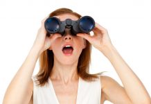 Use the Yogi Berra method woman with binoculars