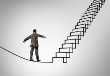 Will you choose fear or opportunity? Man on highwire approaching stairs