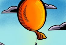 What does it take to succeed in business? Business woman floating away on a balloon